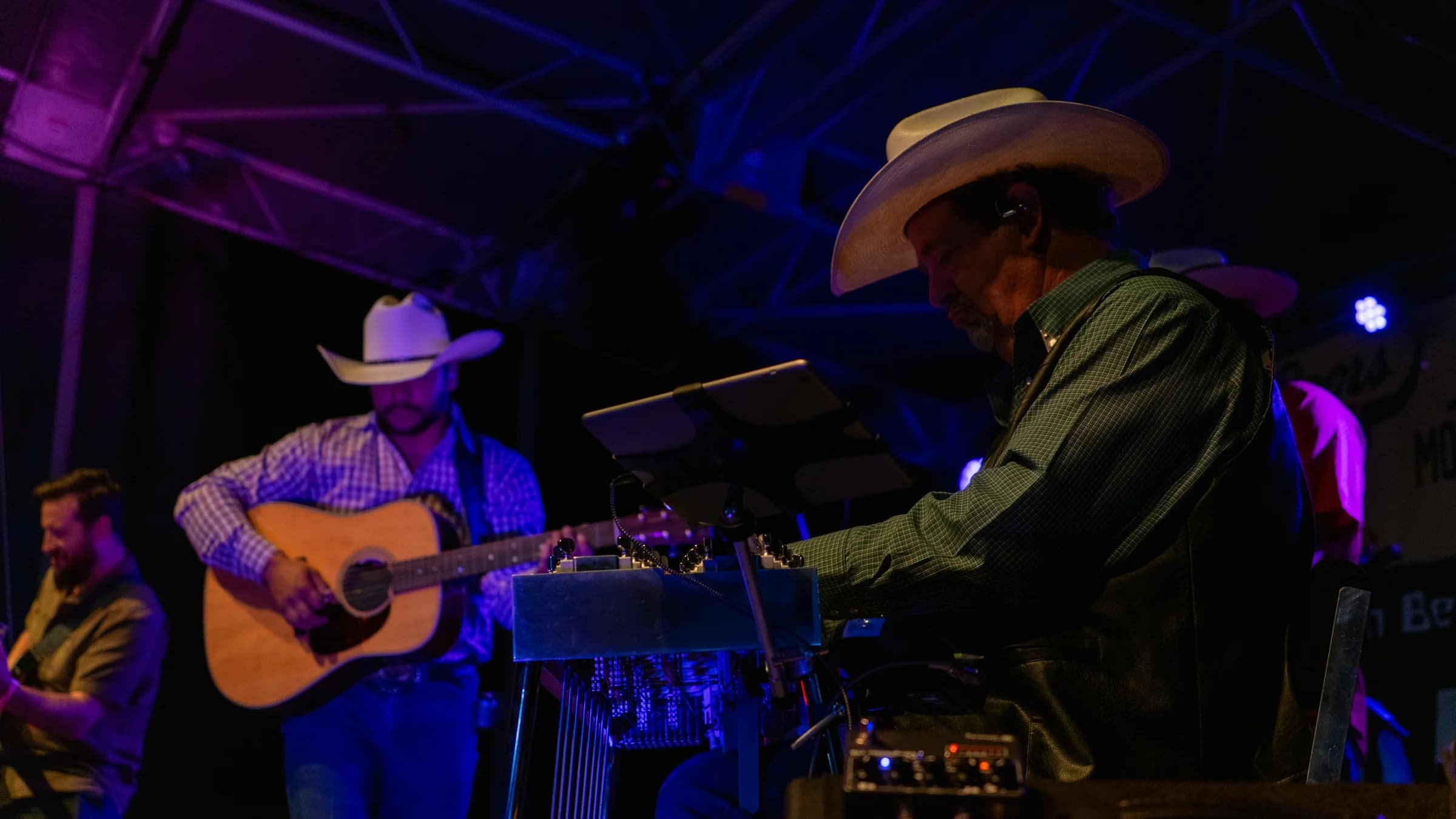 Buck Ford and a bandmate sharing a moment during the set